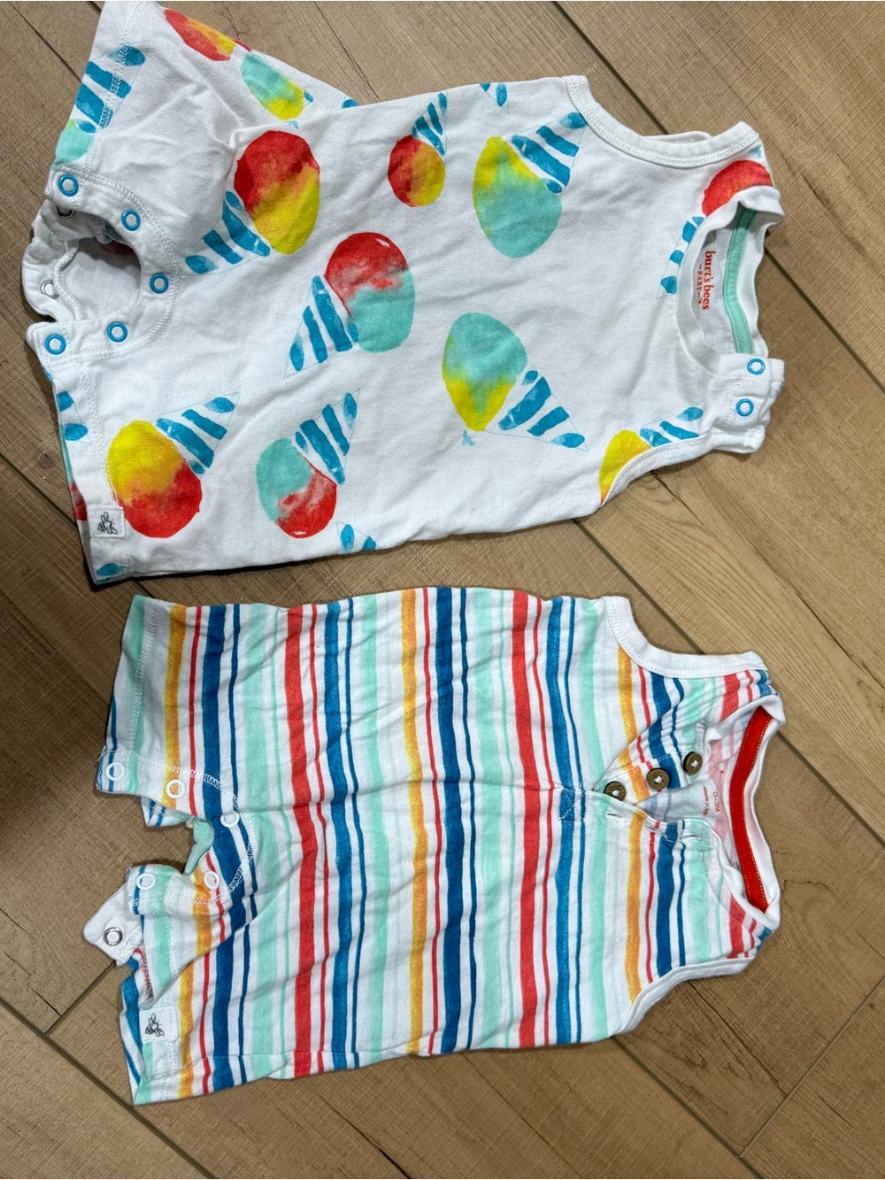 Burt's Bees Baby White Romper with Teal Trim & Blue Snap Accents